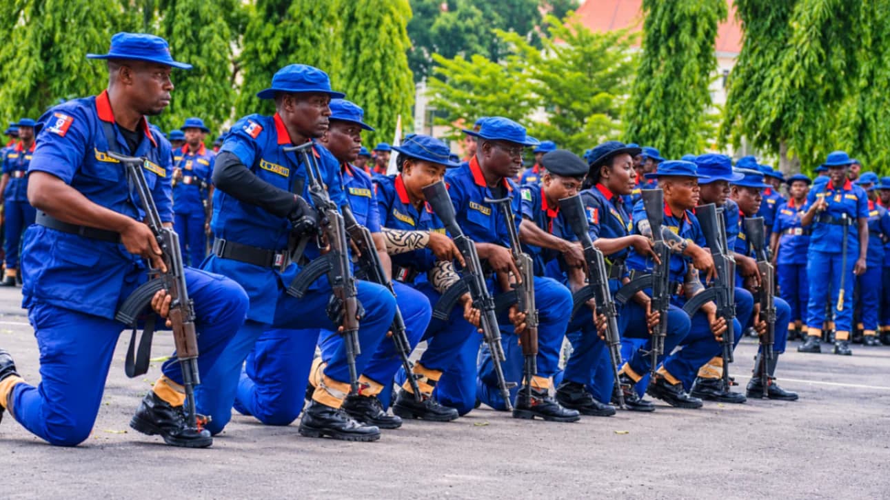 NSCDC officers and protesters following deaths of suspected miners in Minna