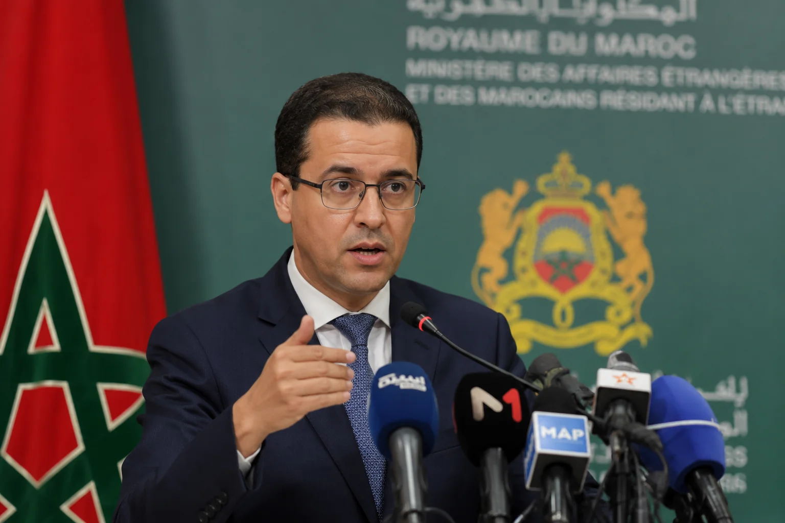 Morocco national football team players celebrate during the 2026 World Cup as controversy spreads over a false statement attributed to Sports Minister Mohamed Saad Berrada about whether the team represents Africa.