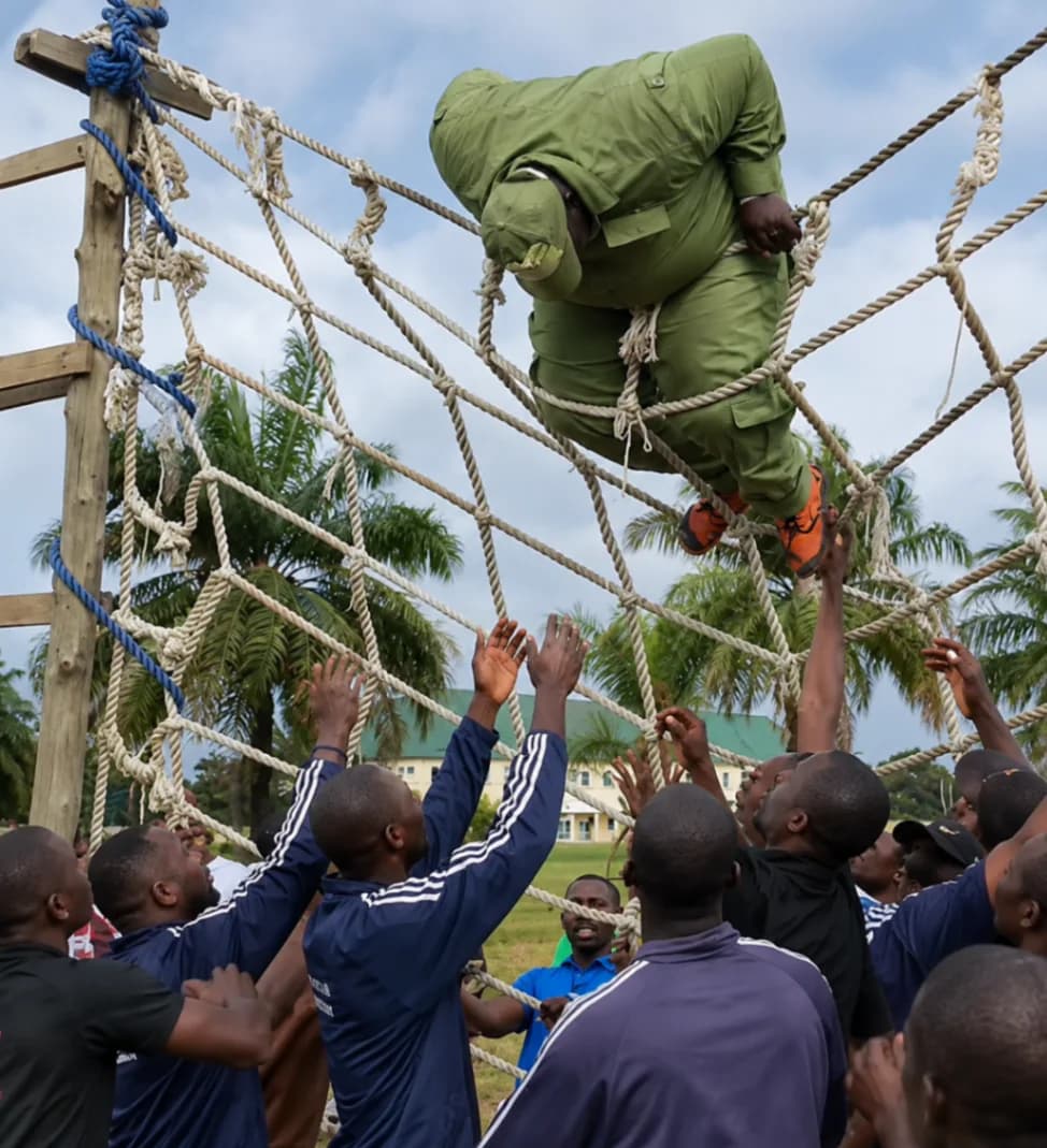 NYSC corps member participating in a Man O’ War drill at an orientation camp