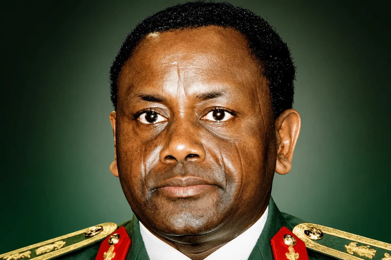 A portrait of former Nigerian military Head of State General Sani Abacha alongside a newly published memoir revisiting the circumstances surrounding his death.